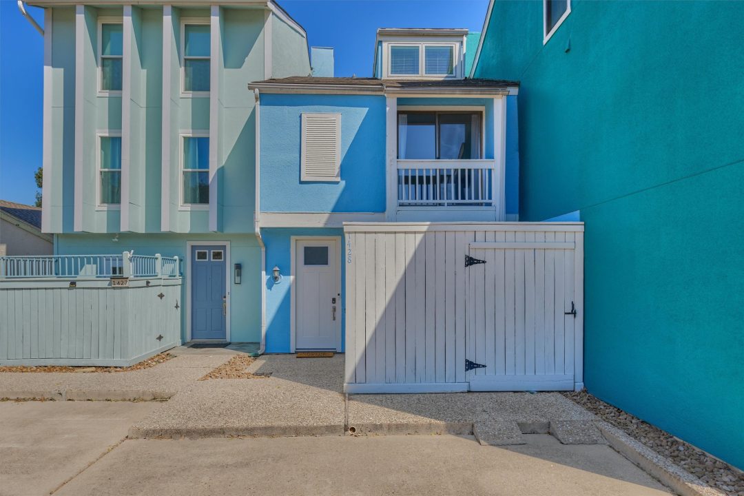 Exterior View of the Entrance of a Blue Condo in Lake Conroe