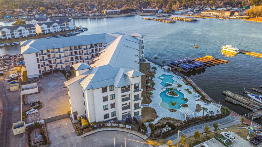 | the mckellar group Aerial View of Luxury Condos on Lake Conroe During the Sunset