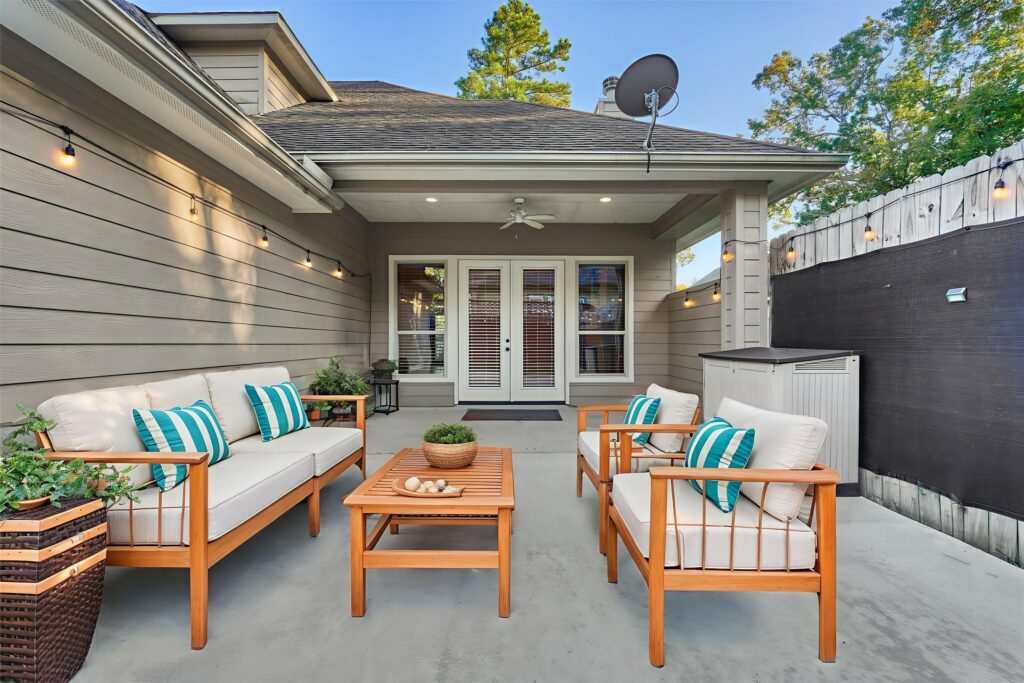 | the mckellar group a Luxury Lake Conroe Home's modern patio nicely decorated.