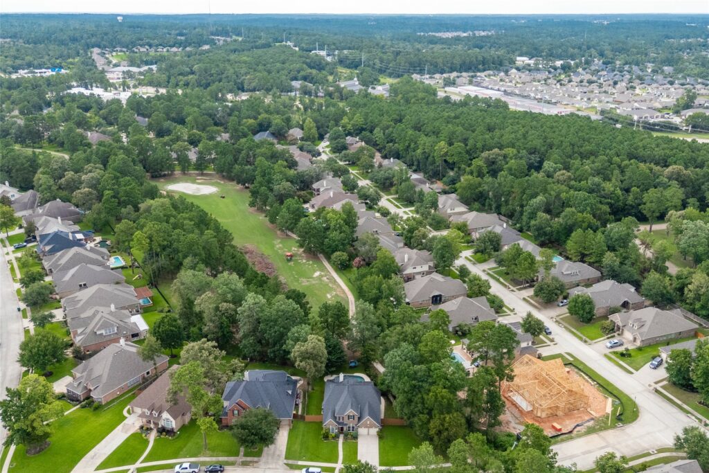 | the mckellar group Aerial View of a Golf Course Neighborhood in Conroe Texas