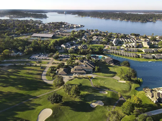 Aerial View of April Sound Country Club and Neighboring Homes by Lake Conroe