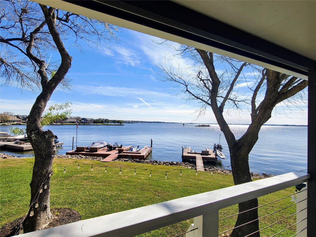 | the mckellar group View of Docks on Lake Conroe from the Back Porch of a Luxury Condo