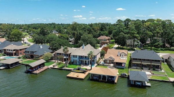 | the mckellar group Aerial View of High End Homes with Lake Access Docks Along Lake Conroe