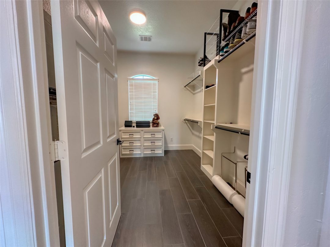 | the mckellar group a Large Walk in Closet with Lots of Storage Space Viewed from the Door
